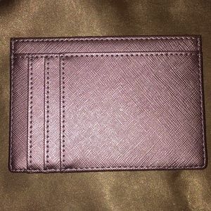 Rose gold credit card holder.